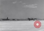 Image of P-38 aircraft of the 318th Fighter Group landing Okinawa Ryukyu Islands, 1945, second 9 stock footage video 65675034706