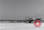 Image of P-38 aircraft of the 318th Fighter Group landing Okinawa Ryukyu Islands, 1945, second 11 stock footage video 65675034706
