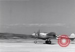 Image of P-38 aircraft of the 318th Fighter Group landing Okinawa Ryukyu Islands, 1945, second 12 stock footage video 65675034706