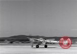 Image of P-38 aircraft of the 318th Fighter Group landing Okinawa Ryukyu Islands, 1945, second 13 stock footage video 65675034706