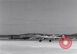 Image of P-38 aircraft of the 318th Fighter Group landing Okinawa Ryukyu Islands, 1945, second 14 stock footage video 65675034706