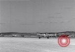 Image of P-38 aircraft of the 318th Fighter Group landing Okinawa Ryukyu Islands, 1945, second 15 stock footage video 65675034706
