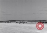 Image of P-38 aircraft of the 318th Fighter Group landing Okinawa Ryukyu Islands, 1945, second 16 stock footage video 65675034706