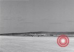 Image of P-38 aircraft of the 318th Fighter Group landing Okinawa Ryukyu Islands, 1945, second 17 stock footage video 65675034706