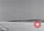 Image of P-38 aircraft of the 318th Fighter Group landing Okinawa Ryukyu Islands, 1945, second 20 stock footage video 65675034706