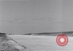 Image of P-38 aircraft of the 318th Fighter Group landing Okinawa Ryukyu Islands, 1945, second 23 stock footage video 65675034706