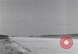 Image of P-38 aircraft of the 318th Fighter Group landing Okinawa Ryukyu Islands, 1945, second 24 stock footage video 65675034706
