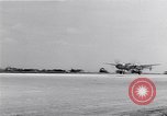 Image of P-38 aircraft of the 318th Fighter Group landing Okinawa Ryukyu Islands, 1945, second 25 stock footage video 65675034706