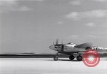 Image of P-38 aircraft of the 318th Fighter Group landing Okinawa Ryukyu Islands, 1945, second 27 stock footage video 65675034706