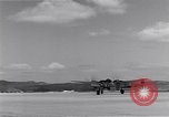 Image of P-38 aircraft of the 318th Fighter Group landing Okinawa Ryukyu Islands, 1945, second 29 stock footage video 65675034706