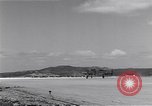 Image of P-38 aircraft of the 318th Fighter Group landing Okinawa Ryukyu Islands, 1945, second 30 stock footage video 65675034706