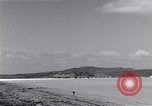 Image of P-38 aircraft of the 318th Fighter Group landing Okinawa Ryukyu Islands, 1945, second 31 stock footage video 65675034706