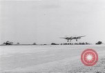 Image of P-38 aircraft of the 318th Fighter Group landing Okinawa Ryukyu Islands, 1945, second 33 stock footage video 65675034706