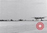 Image of P-38 aircraft of the 318th Fighter Group landing Okinawa Ryukyu Islands, 1945, second 34 stock footage video 65675034706