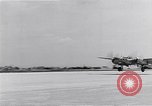 Image of P-38 aircraft of the 318th Fighter Group landing Okinawa Ryukyu Islands, 1945, second 35 stock footage video 65675034706