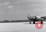Image of P-38 aircraft of the 318th Fighter Group landing Okinawa Ryukyu Islands, 1945, second 36 stock footage video 65675034706