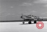 Image of P-38 aircraft of the 318th Fighter Group landing Okinawa Ryukyu Islands, 1945, second 37 stock footage video 65675034706
