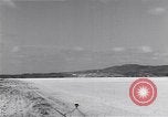 Image of P-38 aircraft of the 318th Fighter Group landing Okinawa Ryukyu Islands, 1945, second 43 stock footage video 65675034706