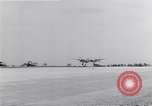 Image of P-38 aircraft of the 318th Fighter Group landing Okinawa Ryukyu Islands, 1945, second 44 stock footage video 65675034706
