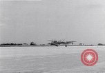 Image of P-38 aircraft of the 318th Fighter Group landing Okinawa Ryukyu Islands, 1945, second 45 stock footage video 65675034706