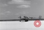 Image of P-38 aircraft of the 318th Fighter Group landing Okinawa Ryukyu Islands, 1945, second 48 stock footage video 65675034706