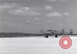 Image of P-38 aircraft of the 318th Fighter Group landing Okinawa Ryukyu Islands, 1945, second 49 stock footage video 65675034706