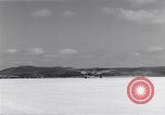 Image of P-38 aircraft of the 318th Fighter Group landing Okinawa Ryukyu Islands, 1945, second 51 stock footage video 65675034706
