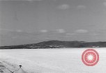 Image of P-38 aircraft of the 318th Fighter Group landing Okinawa Ryukyu Islands, 1945, second 53 stock footage video 65675034706