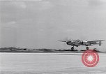 Image of P-38 aircraft of the 318th Fighter Group landing Okinawa Ryukyu Islands, 1945, second 56 stock footage video 65675034706