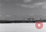 Image of P-38 aircraft of the 318th Fighter Group landing Okinawa Ryukyu Islands, 1945, second 59 stock footage video 65675034706