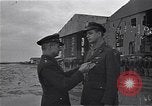 Image of General awards Distinguished Flying Cross to Elliott Roosevelt North Africa, 1942, second 16 stock footage video 65675034708