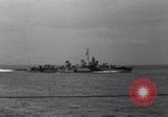 Image of battleships Pacific Theater, 1944, second 8 stock footage video 65675034731
