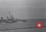 Image of battleships Pacific Theater, 1944, second 16 stock footage video 65675034731