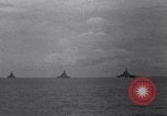 Image of battleships Pacific Theater, 1944, second 32 stock footage video 65675034731