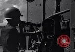 Image of Sailor bugler blows call through PA system on US warship Pacific Ocean, 1944, second 11 stock footage video 65675034732