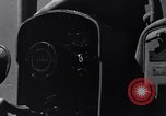 Image of Sailor bugler blows call through PA system on US warship Pacific Ocean, 1944, second 20 stock footage video 65675034732