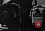 Image of Sailor bugler blows call through PA system on US warship Pacific Ocean, 1944, second 25 stock footage video 65675034732