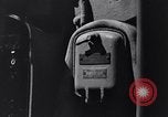 Image of Sailor bugler blows call through PA system on US warship Pacific Ocean, 1944, second 27 stock footage video 65675034732