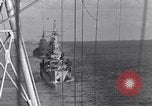 Image of Sailor bugler blows call through PA system on US warship Pacific Ocean, 1944, second 35 stock footage video 65675034732