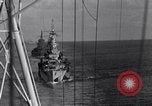 Image of Sailor bugler blows call through PA system on US warship Pacific Ocean, 1944, second 37 stock footage video 65675034732