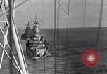 Image of Sailor bugler blows call through PA system on US warship Pacific Ocean, 1944, second 38 stock footage video 65675034732