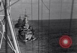 Image of Sailor bugler blows call through PA system on US warship Pacific Ocean, 1944, second 40 stock footage video 65675034732