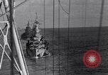 Image of Sailor bugler blows call through PA system on US warship Pacific Ocean, 1944, second 42 stock footage video 65675034732