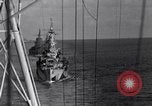 Image of Sailor bugler blows call through PA system on US warship Pacific Ocean, 1944, second 44 stock footage video 65675034732