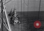 Image of Sailor bugler blows call through PA system on US warship Pacific Ocean, 1944, second 45 stock footage video 65675034732