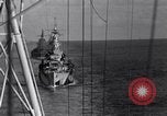 Image of Sailor bugler blows call through PA system on US warship Pacific Ocean, 1944, second 47 stock footage video 65675034732