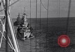 Image of Sailor bugler blows call through PA system on US warship Pacific Ocean, 1944, second 48 stock footage video 65675034732