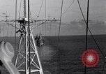 Image of Sailor bugler blows call through PA system on US warship Pacific Ocean, 1944, second 61 stock footage video 65675034732