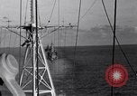 Image of Sailor bugler blows call through PA system on US warship Pacific Ocean, 1944, second 62 stock footage video 65675034732