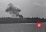Standbild Bombardierung Peleliu Palau Inseln, 1944, aus Sekunde 13 historischem Filmmaterial Videoclip 65675034733